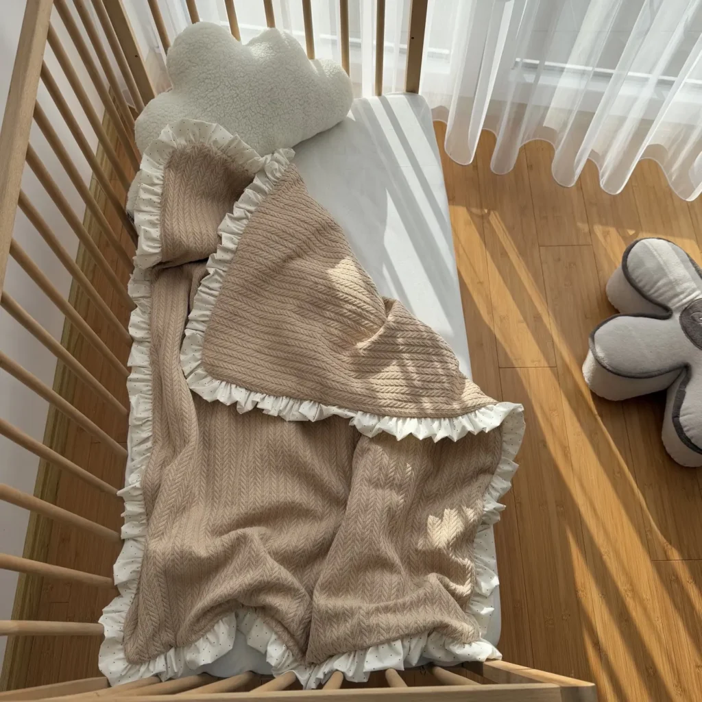 Ruffled Cable-Knit Baby Blanket